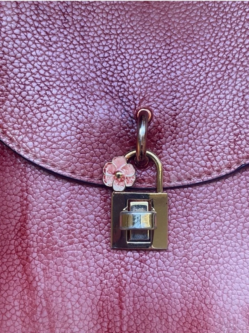 Distressed Circle Backpack With Red Flower lock Accent